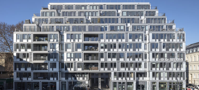 Am Zirkus. Wohn- und Bürohaus mit Hotel- und Gewerbeflächen.